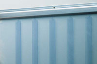 a closeup of a blue strip curtain